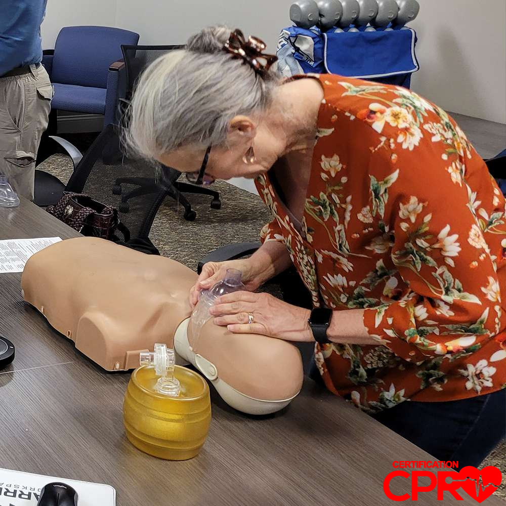 CPR training session with adult mannequin in Jacksonville.